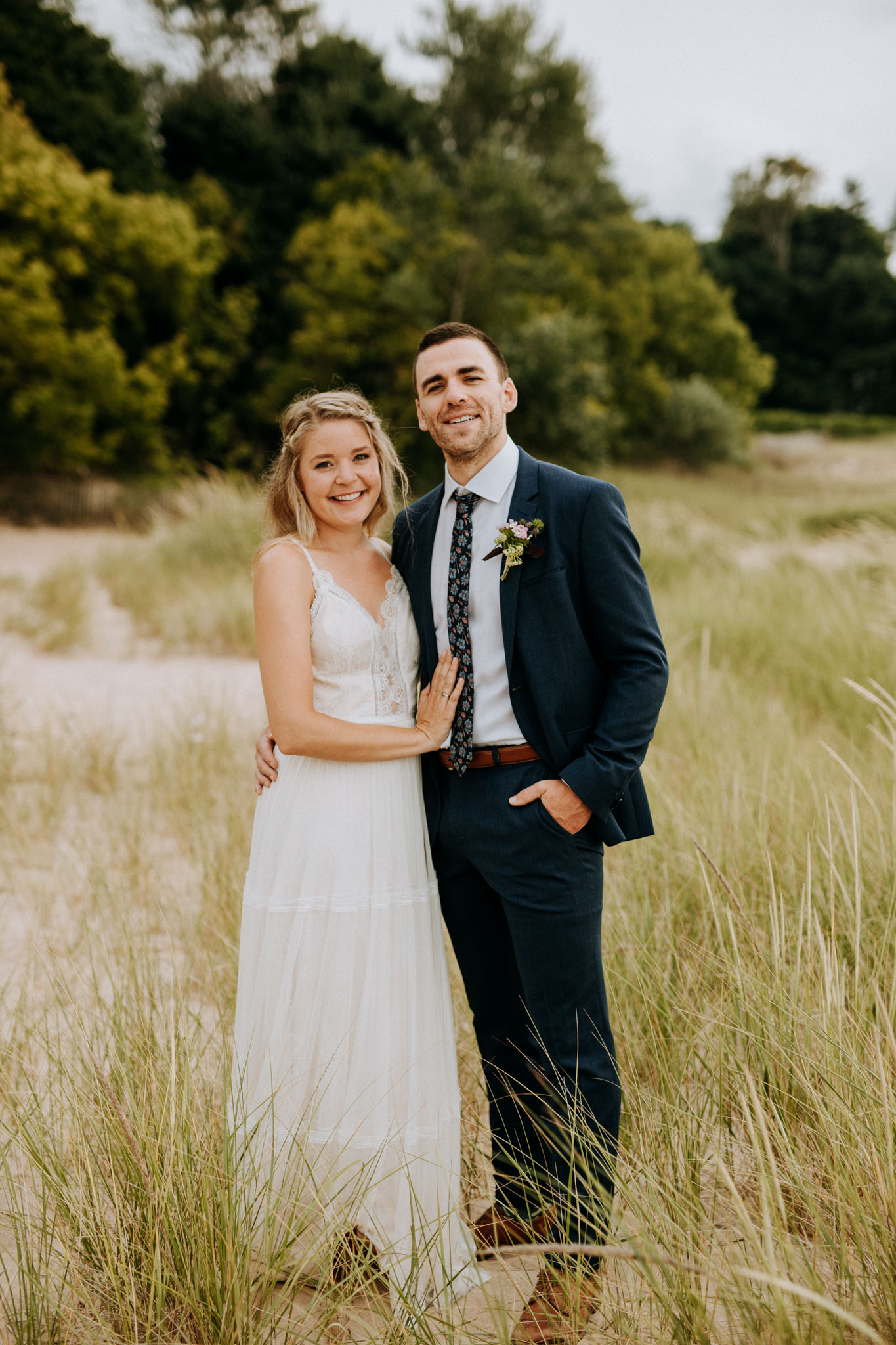 Ali and Sean portrait at Van's Beach in Leland after their wedding