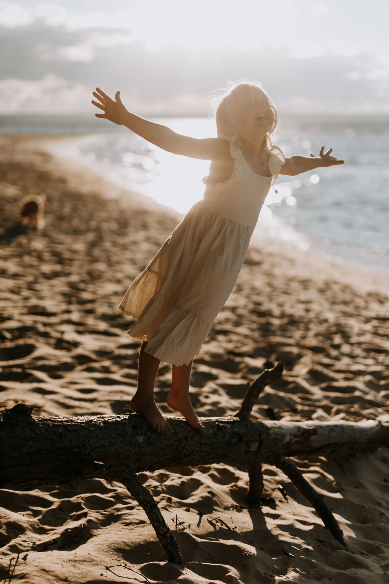 Johnson family walking near the Old Mission Peninsula lighthouse