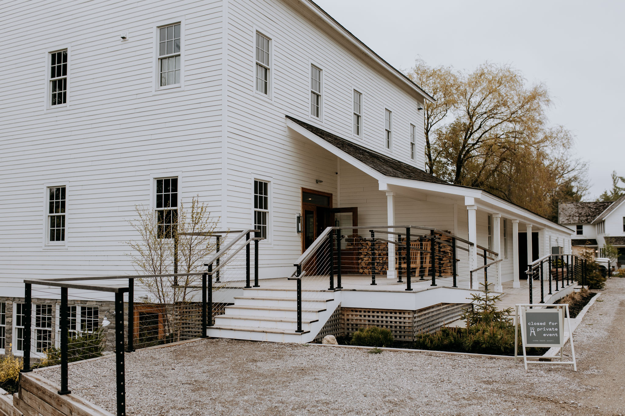 The Mill Glen Arbor wedding venue exterior on the river Northern Michigan