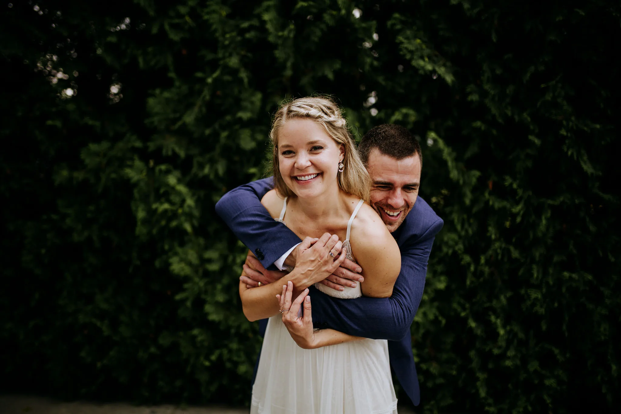 Bride and groom on the Lake Michigan beach in Leland, Michigan on their wedding day