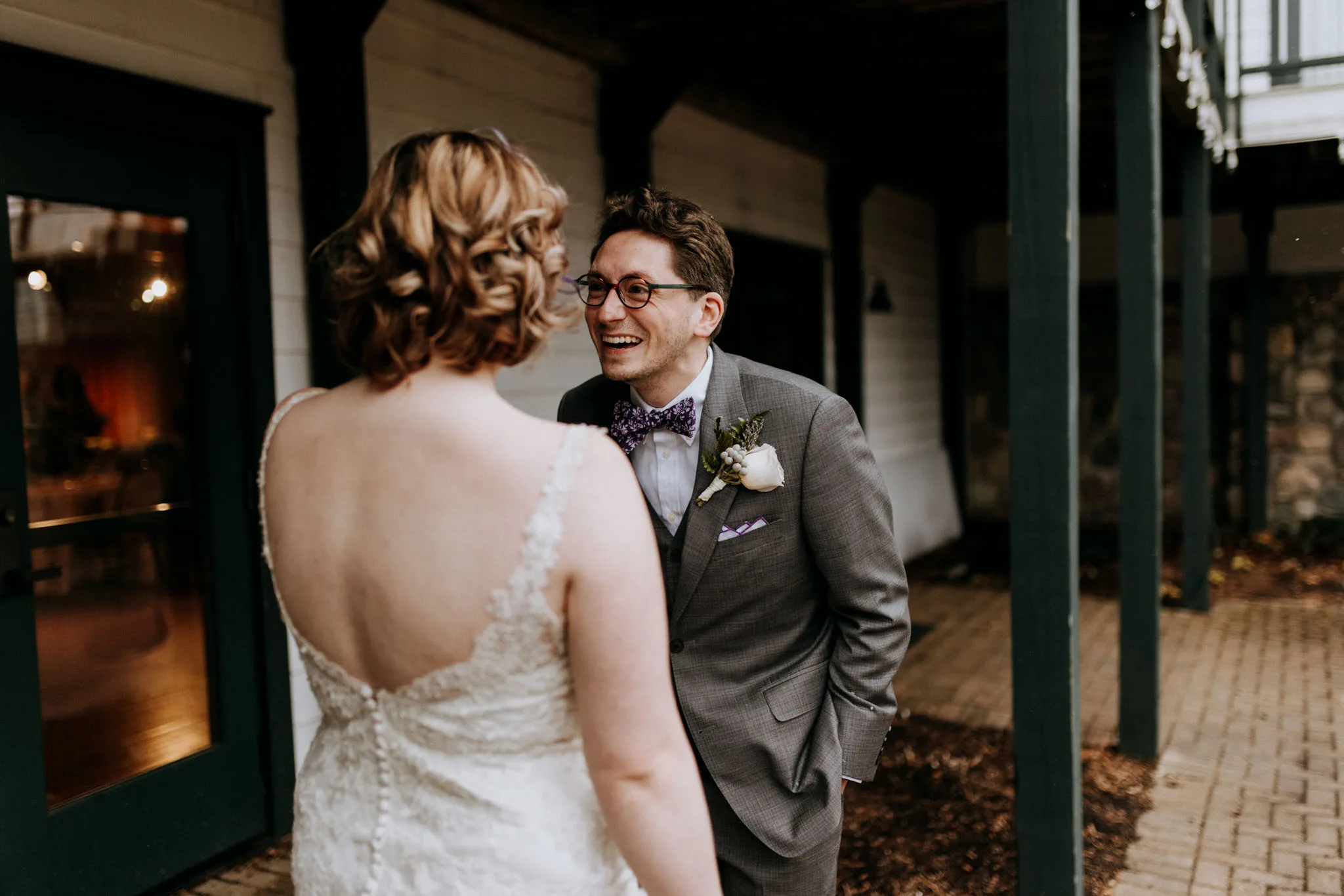 Wedding couple in the snow at the Leland Lodge, Leland Michigan