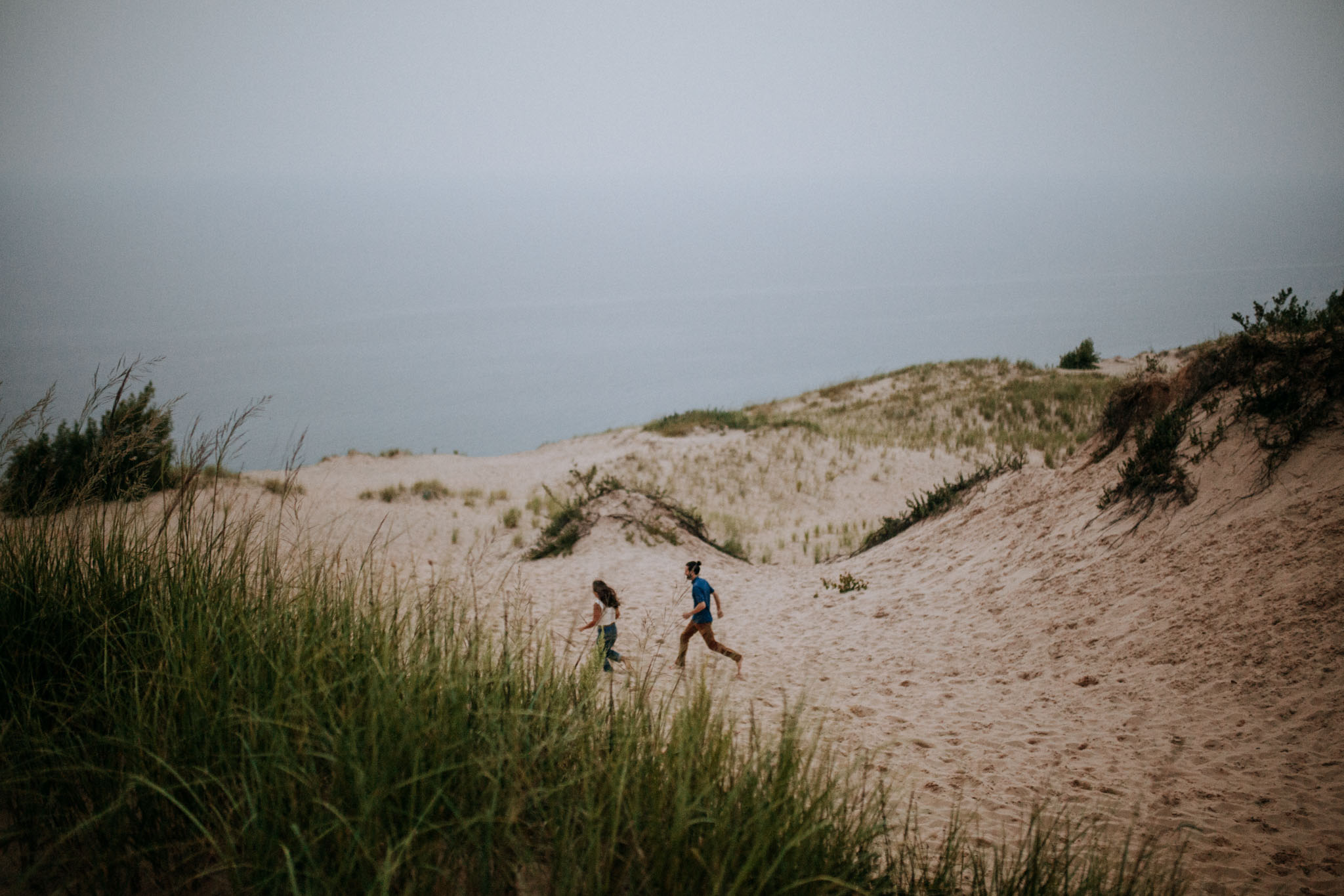 Wide dune overlook view at Pierce Stocking Scenic Drive during an engagement session