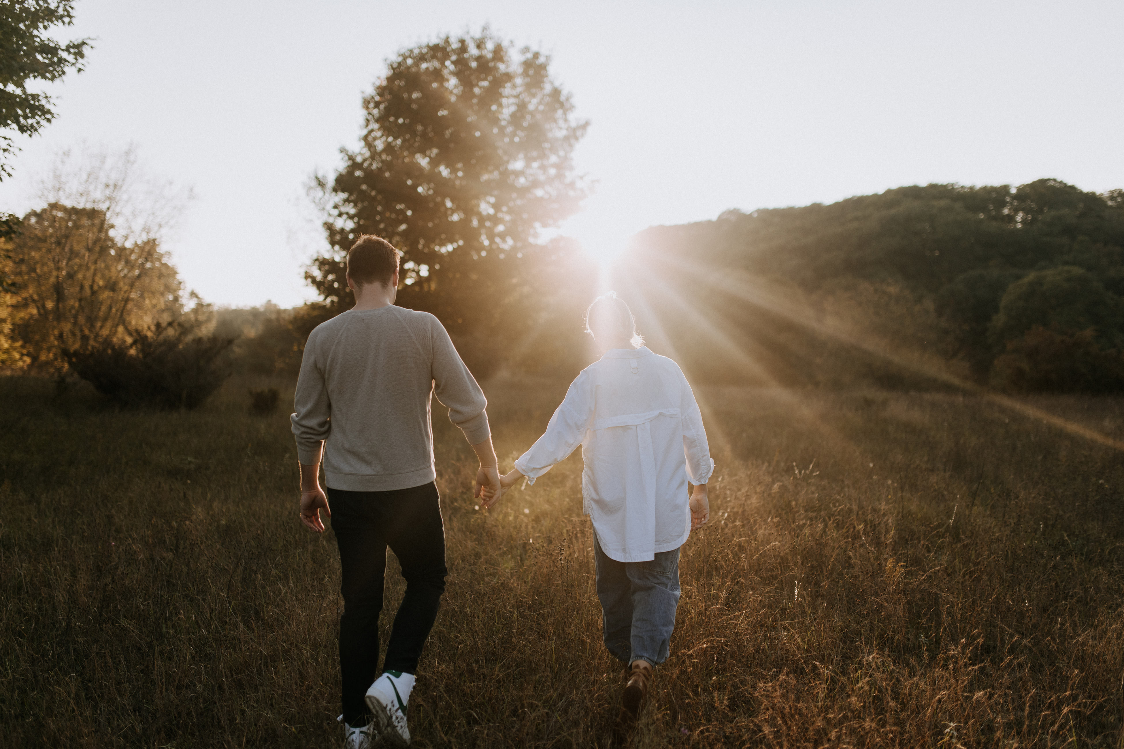 Engagement photography at a Northern Michigan lakeside location, Claire and Peter
