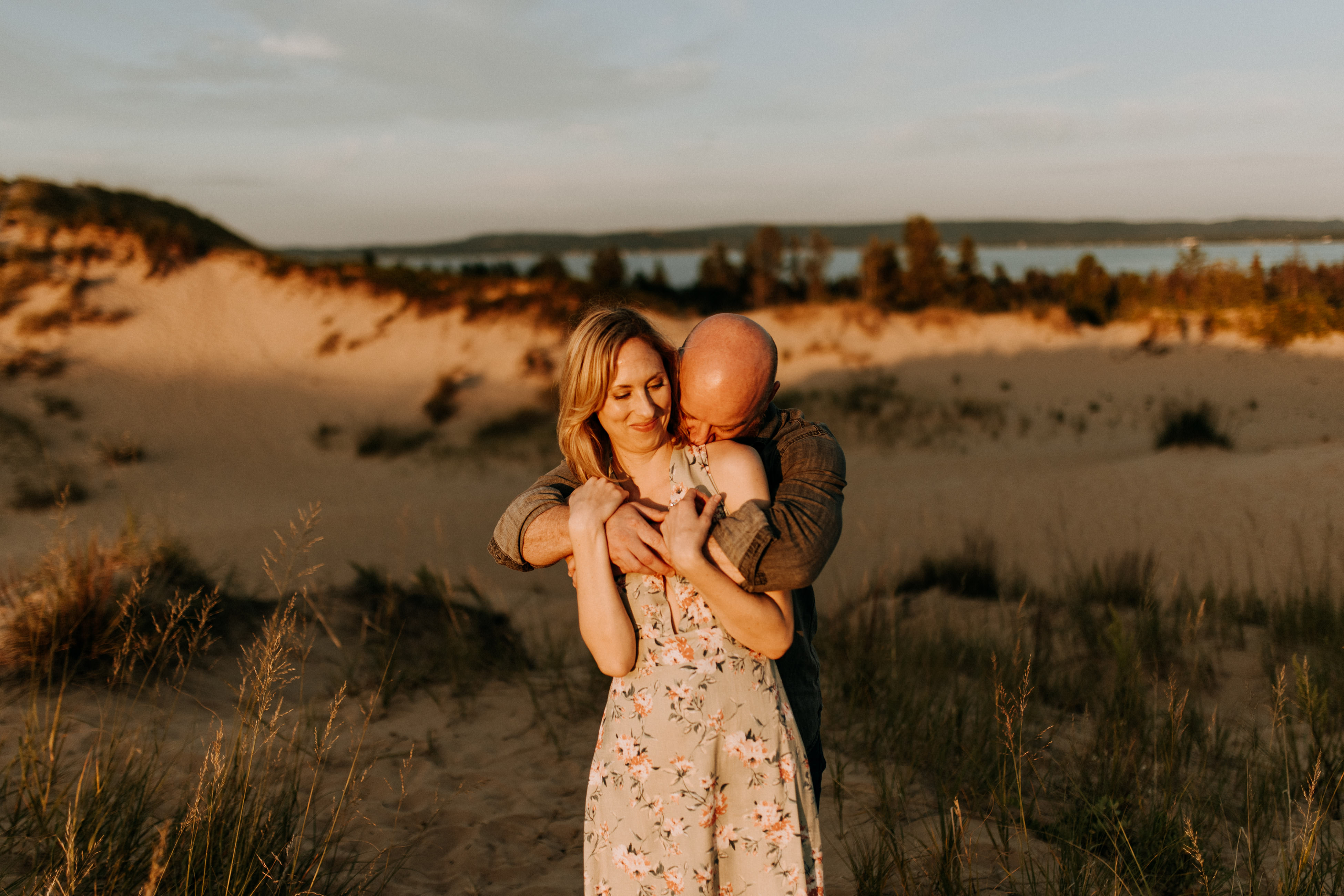 Couple close together during a Northern Michigan engagement session, Maggie and Ryan