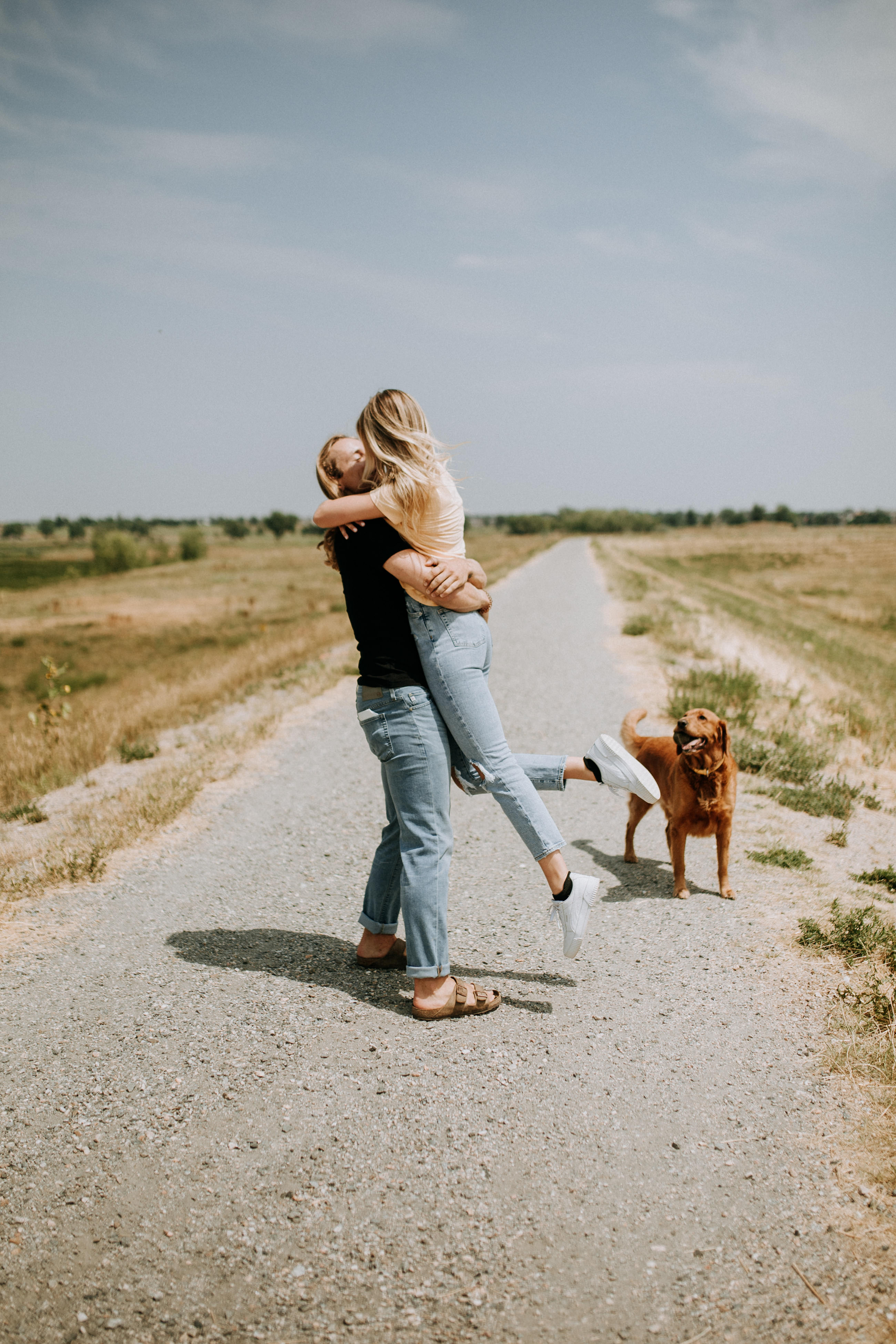 Golden hour engagement portrait near Traverse City, Haley and Jordan