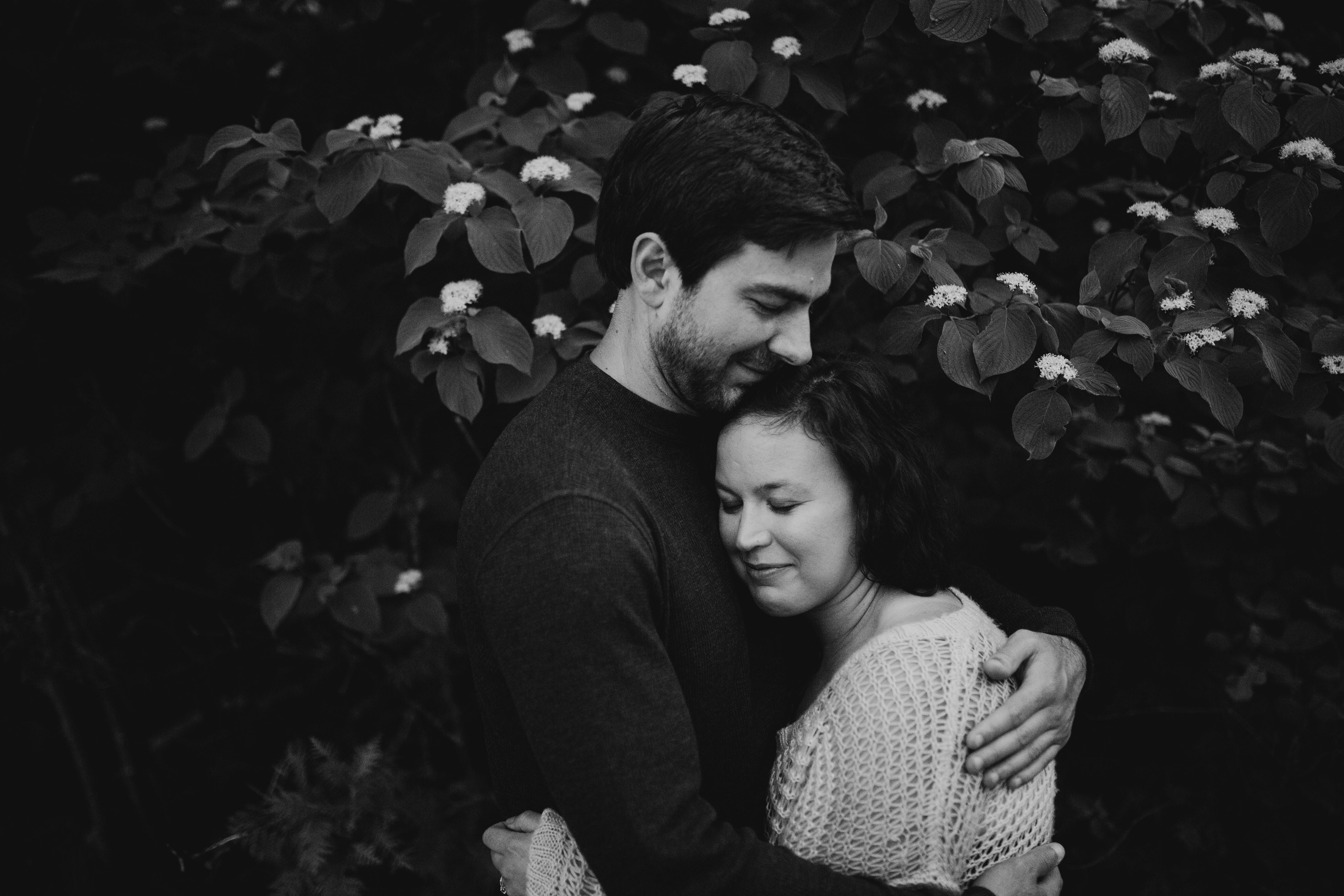 Couple sharing a quiet moment during Traverse City engagement session, Claire and Max