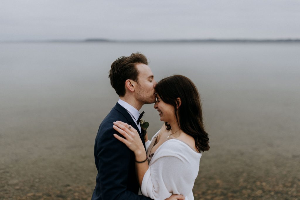 Elopement Couple on winter Grand Traverse Bay