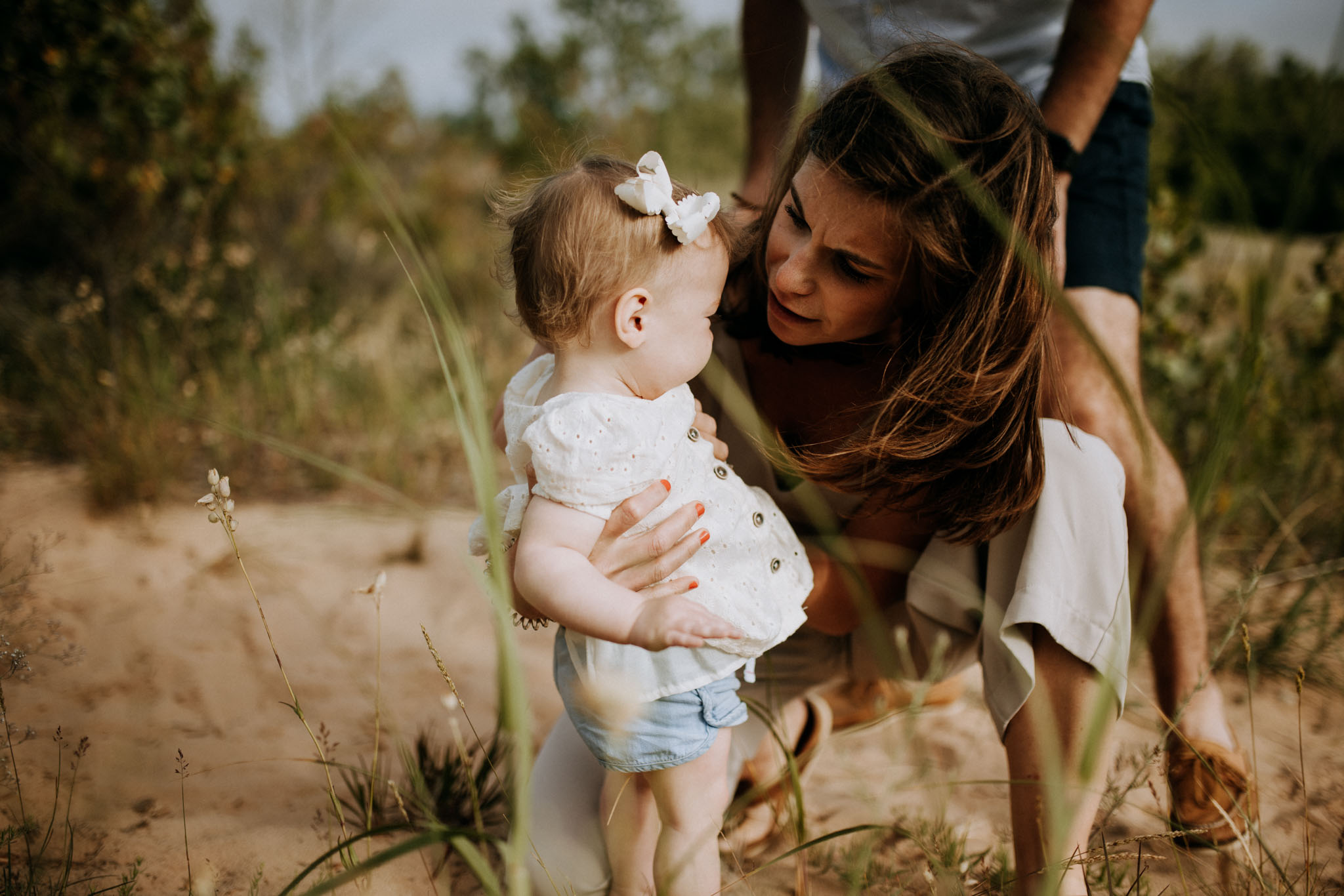 Parents with baby on the Sleeping Bear Dunes boardwalk