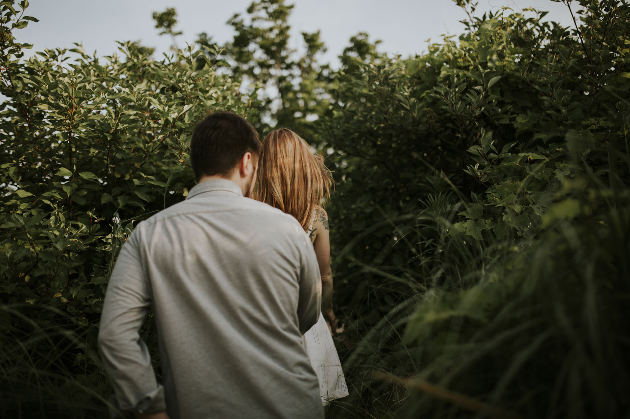 Piper and Leland dancing on the road at Pierce Stocking Scenic Drive at sunset