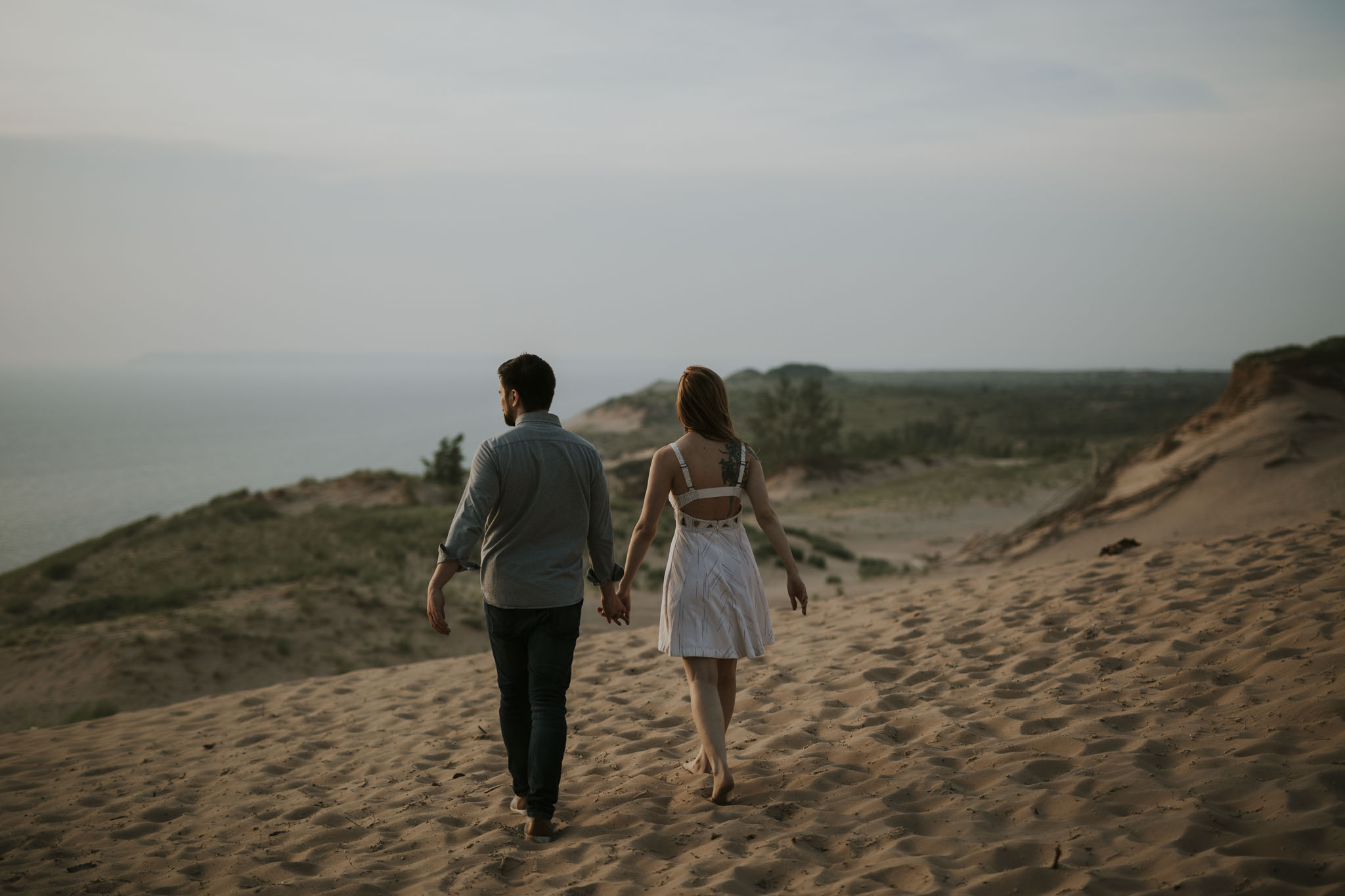 Piper and Leland walking along Pierce Stocking Scenic Drive