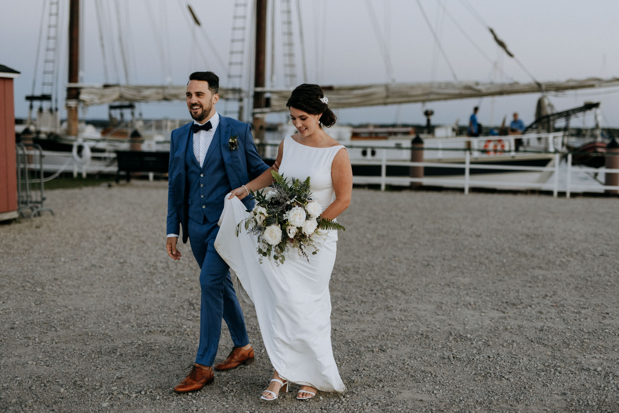 Maggie and Cam laughing together after the ceremony