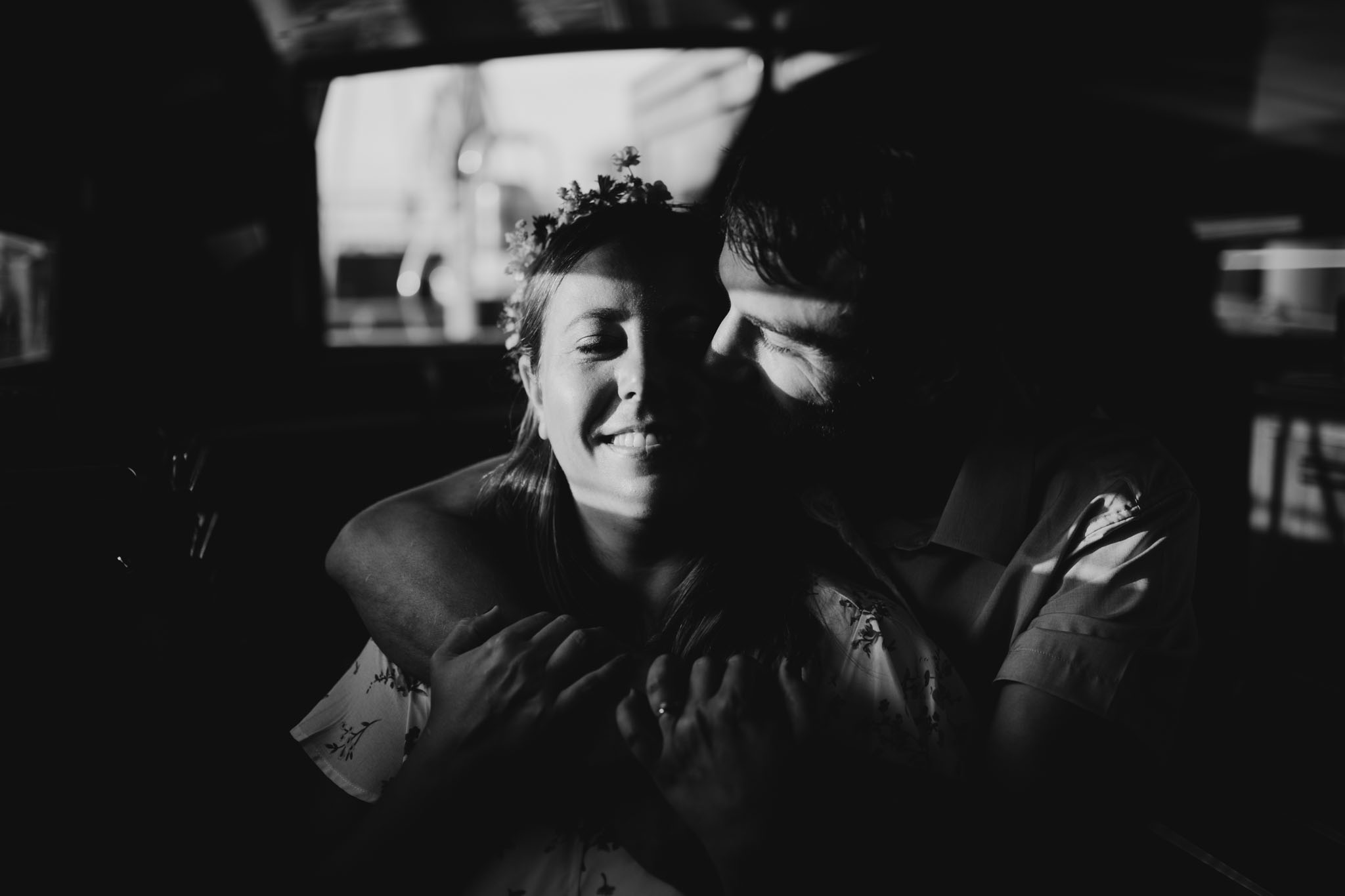 Kate and Jared on the docks at Traverse City harbor after their sailboat elopement